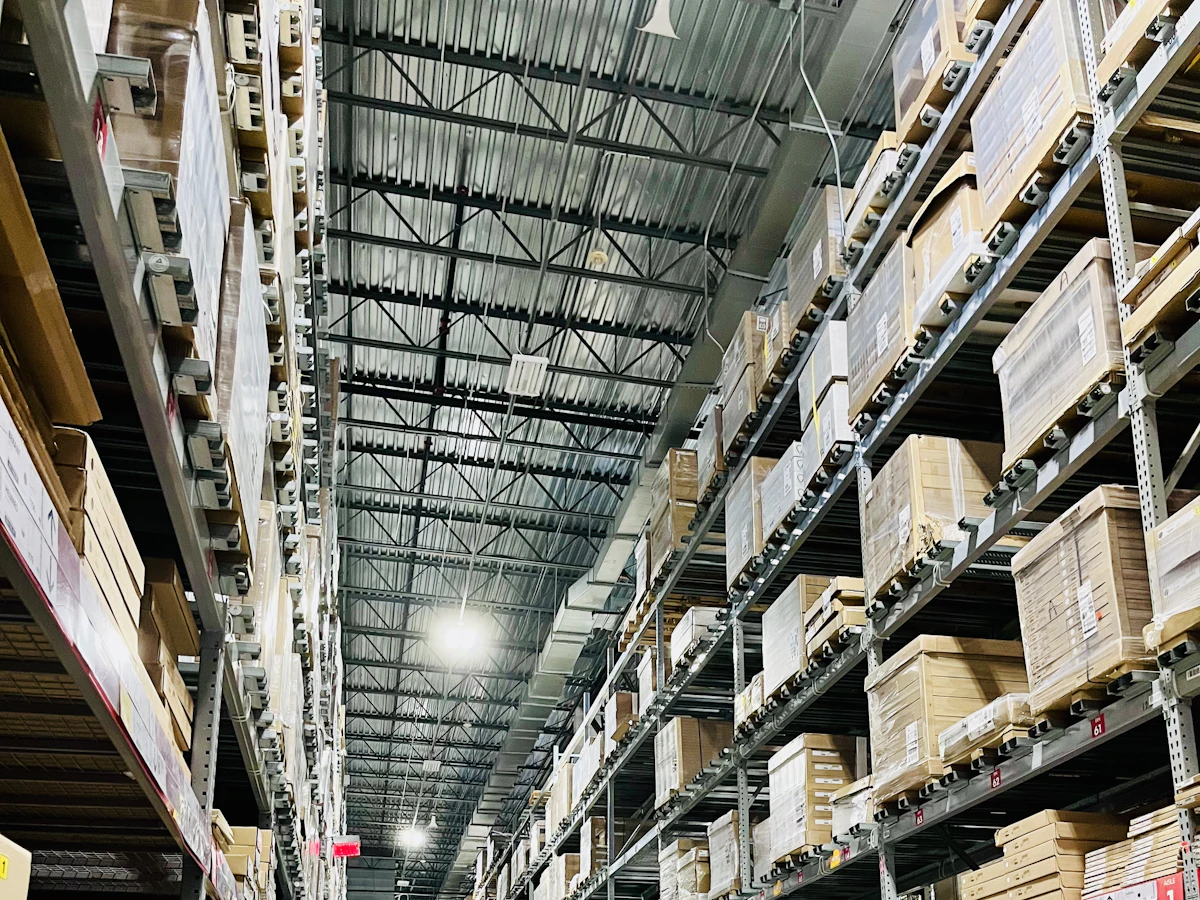 Warehouse shelves stocked with boxed inventory